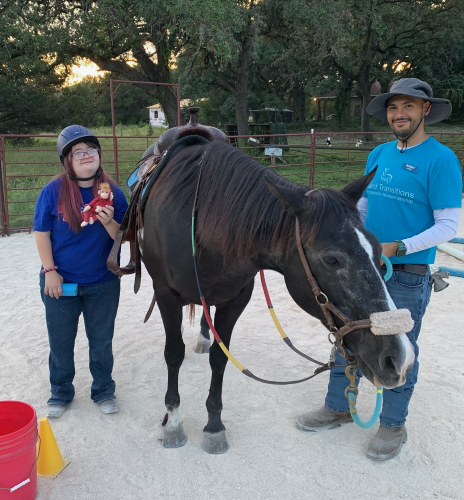 Rider with Autumn the horse and UTTH Program Volunteer