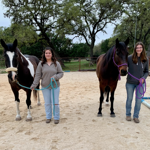 Two UTTH Volunteers with Horses